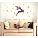 Diseño Vectorial de Reno de Navidad Volador y Estrellas