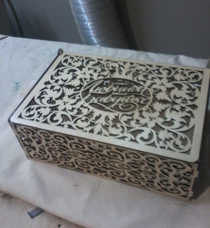Ornate Laser Cut Gift Box with Floral Filigree Free Vector